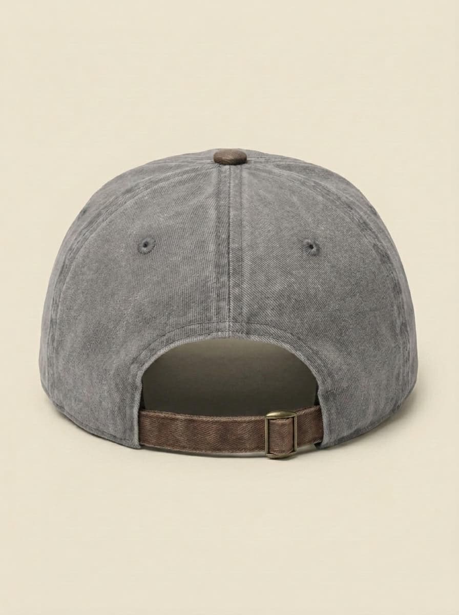 Back of the grey and brown Dale's Depot company hat, showing the adjustable strap.