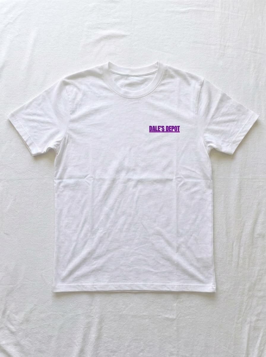 Front of a white t-shirt, blank apart from a small DALE'S DEPOT logo in purple on the left chest.