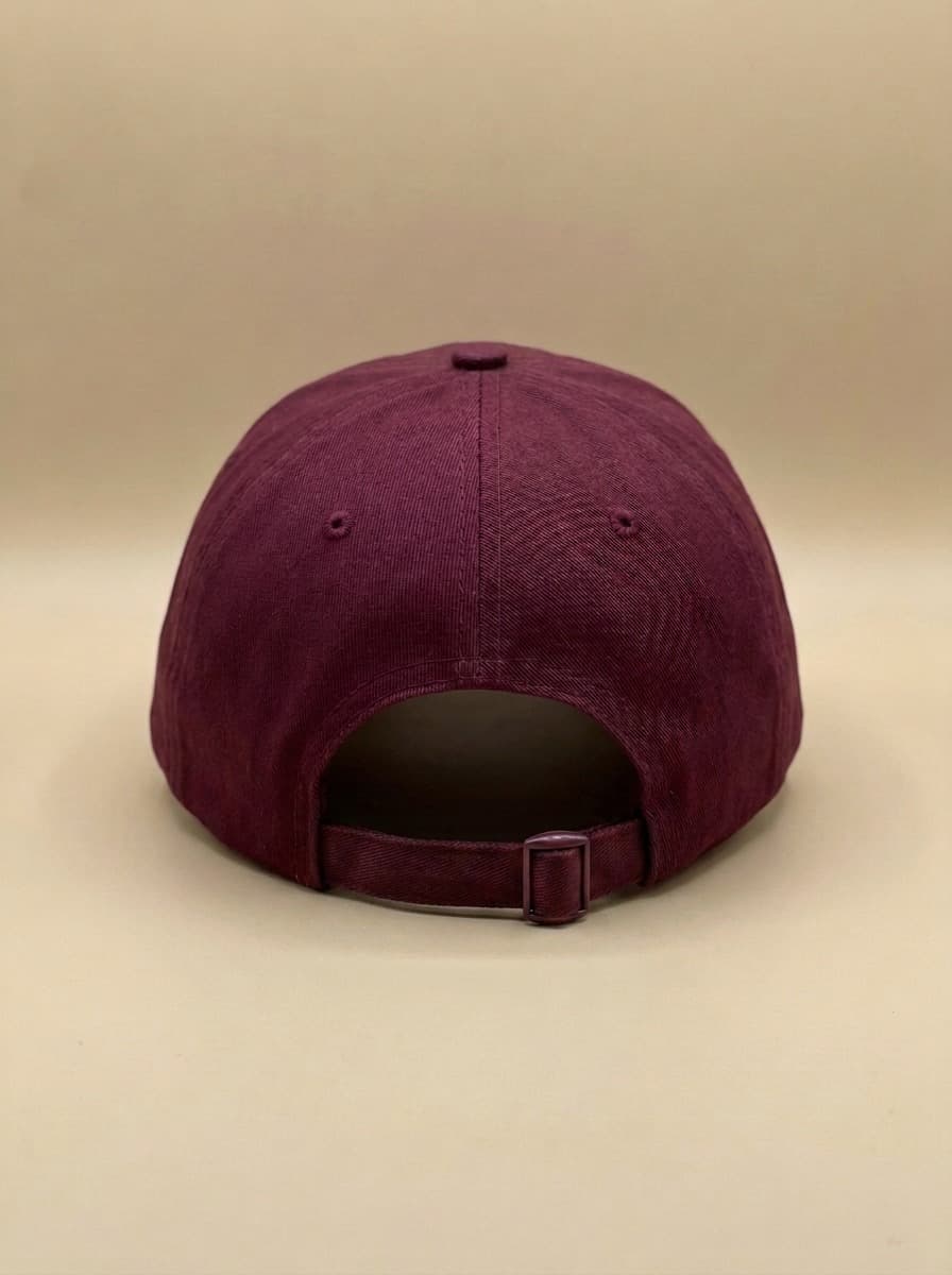 Back of the maroon St. Mary's Bowling League hat, showing the adjustable strap.